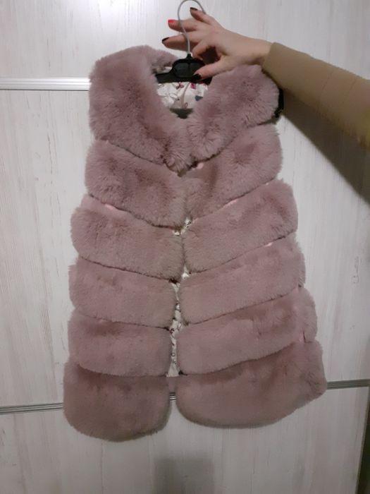 Продам жилетку меховую