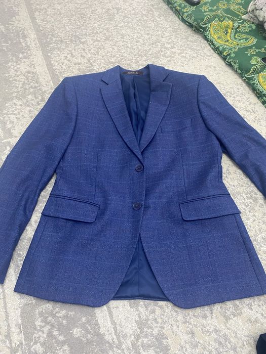Пиджак новый в отличном состояний