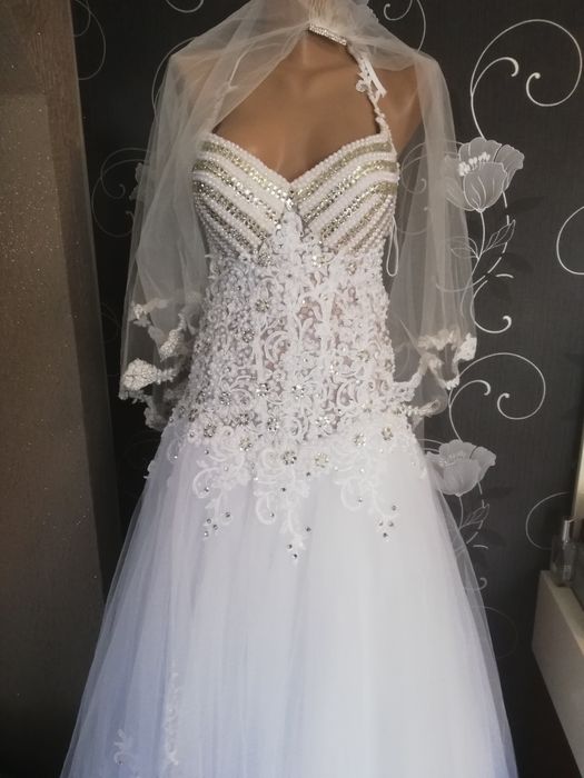 Vând rochii de mireasă