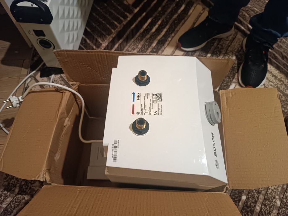 Продавам чисто нов  проточен бойлер BOSCH  на ток 5 литра,1.8kw