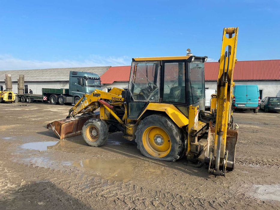 Dezmembrez buldoexcavator Massey Ferguson MF 50HX