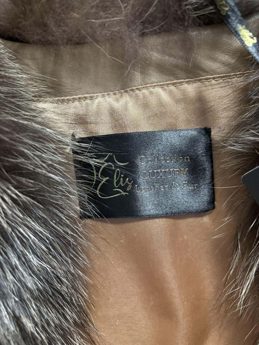 Haina de blană nepurtata