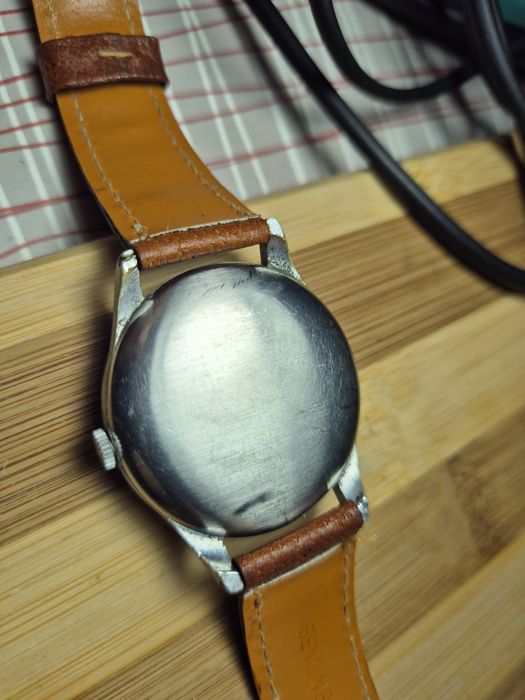 Ultim pret..Movado 1940s, black dial gilt, military