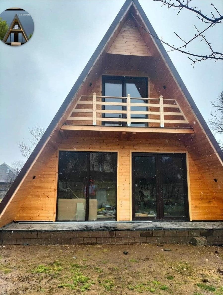 Case și cabane pe structură de lemn