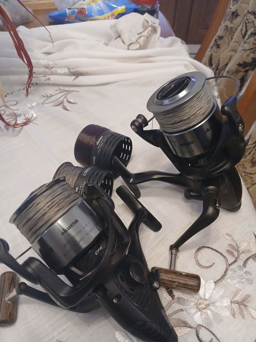 Vând două mulinete Okuma Longbow