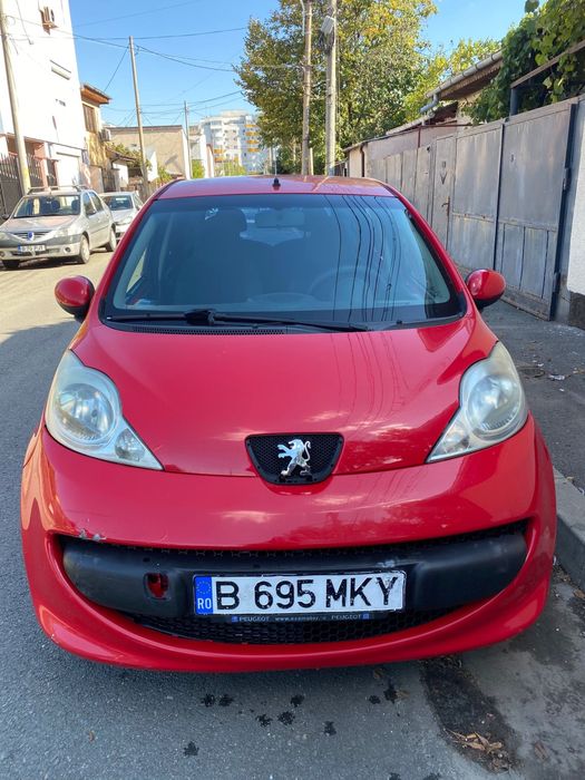 Peugeot 107 rosu