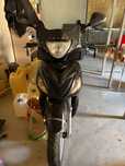 Scuter Suzuki Sixteen