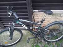 bicicleta  btwin de culoare albastra