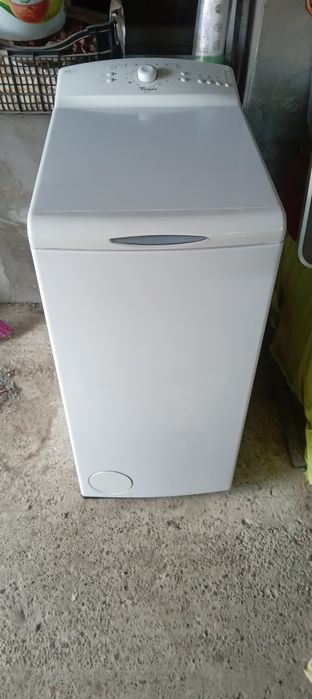 Mașină cu încărcare verticală