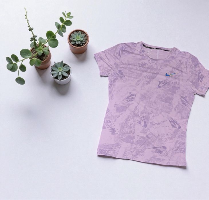 Nike Lilac Graphic Tee – Size M (Fits Like XS)