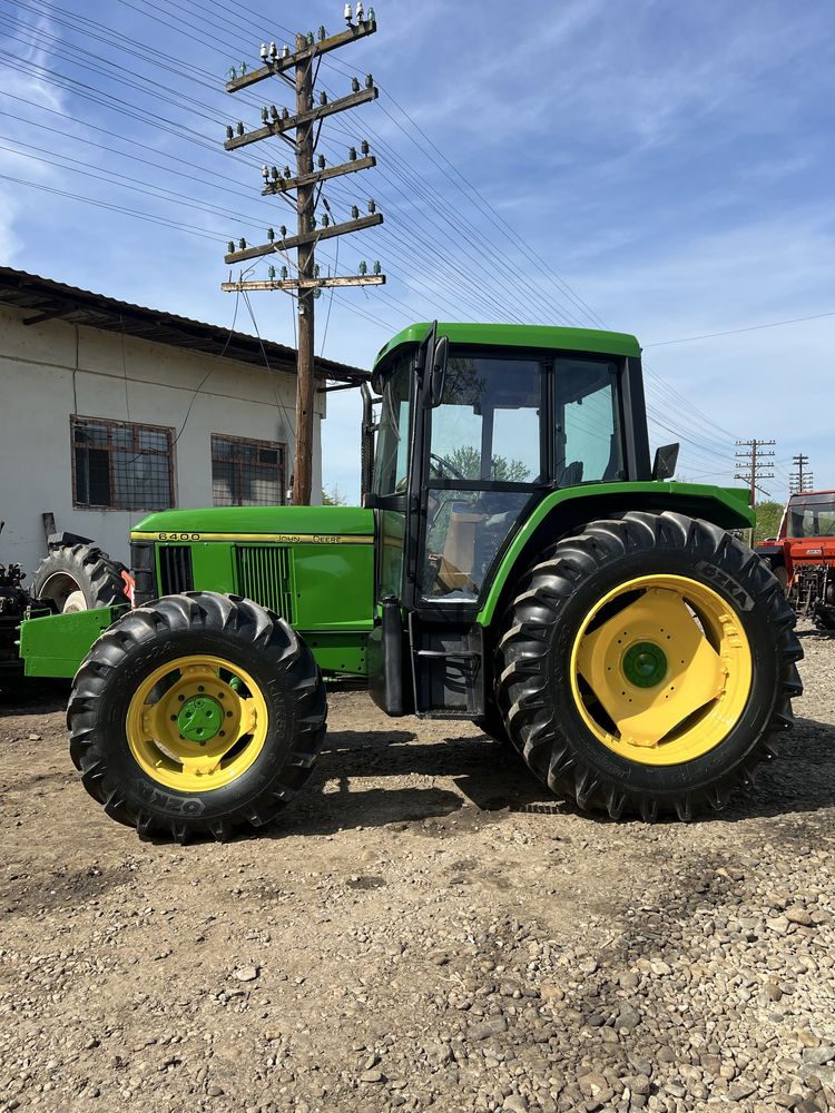 Vand sau schimb tractor John Deere 6400