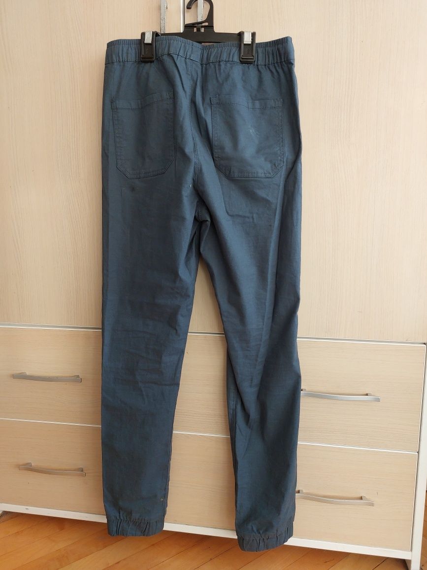 Мъжки панталон JOGER CROPP 28/XS и син панталон DESTINATION