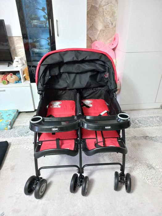 Двухместная коляска