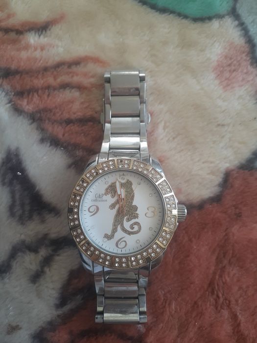 Часы унисекси в отличном состоянии водонепроницаемые