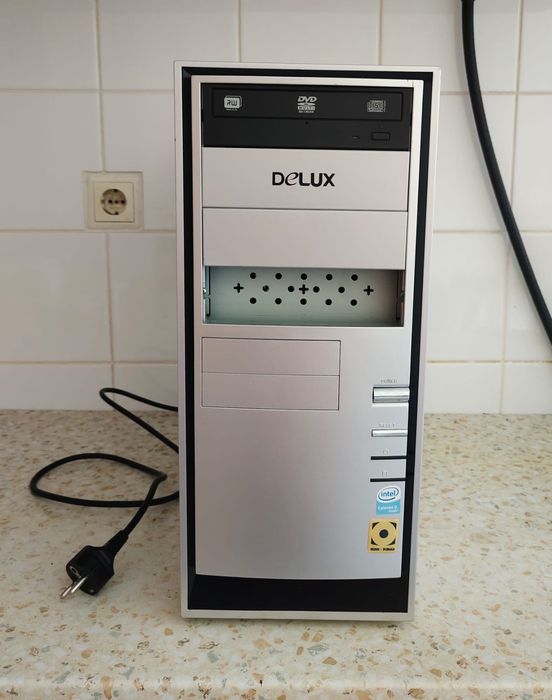 Процессор DELUX  - 3000 тенге