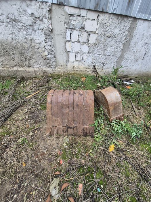 Cupe buldoexcavator caterpilar