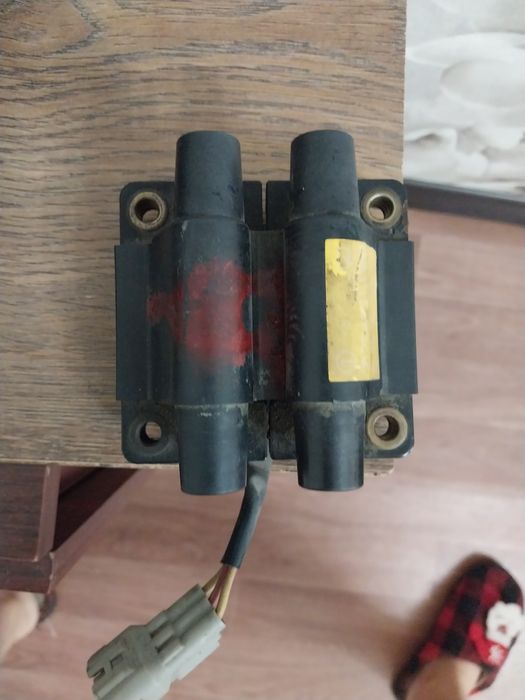 Катушка зажигания на Субару форестер.