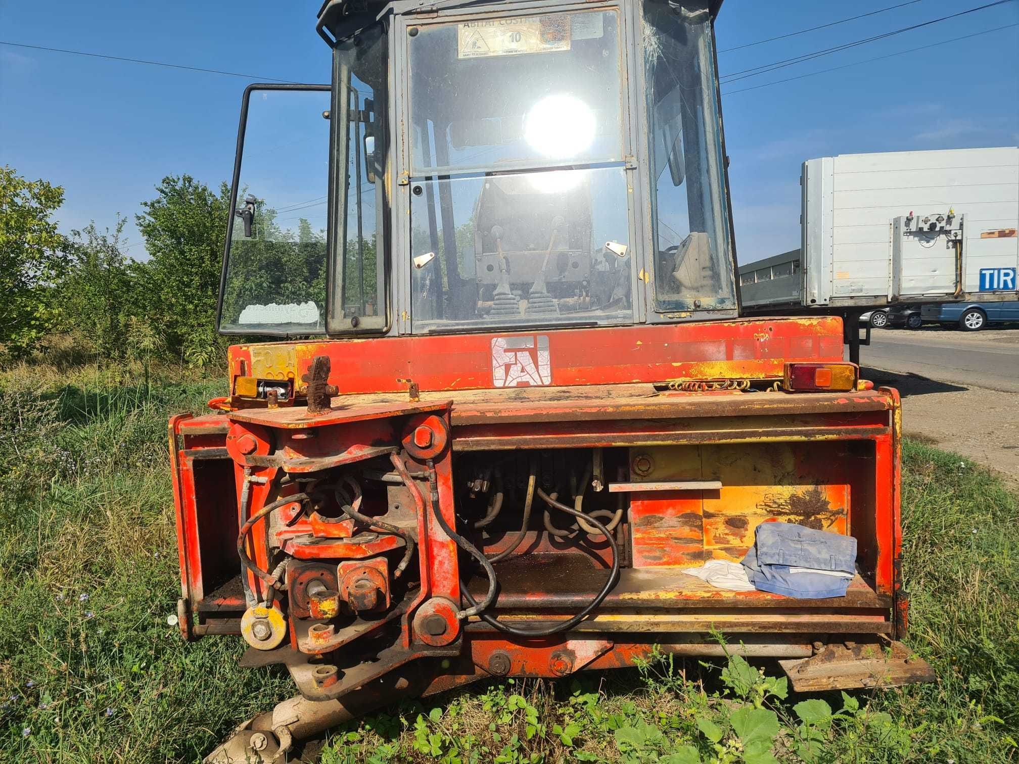 Dezmembrez buldoexcavator FAI Komatsu