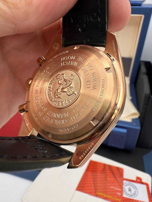 omega speedmaster златно/зелено