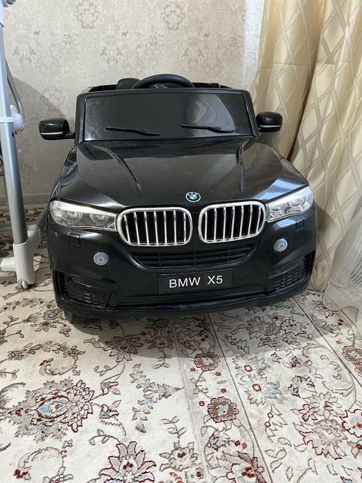 Продается детская машина bmw x5. Ребенок катался только в квартире.