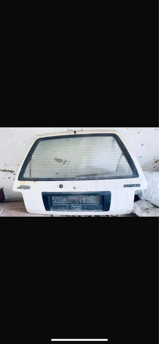 Багажник машины мазда 323