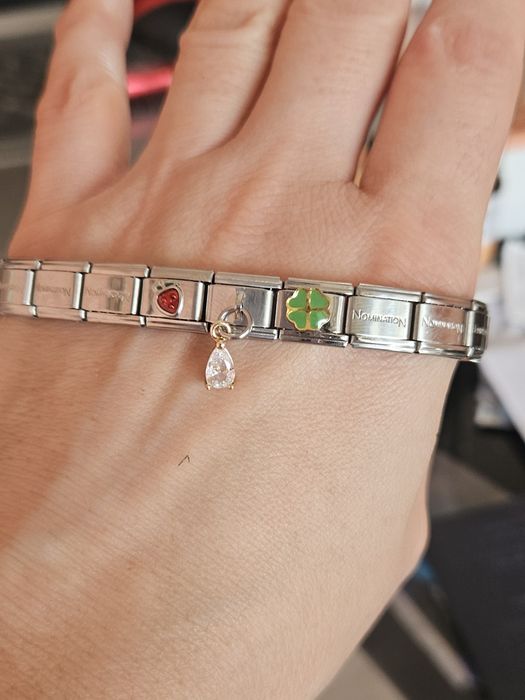 Гривна Nomination.