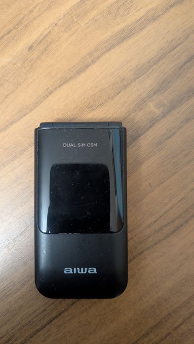Продавам  мобилен телефон AIWA FP-24 с две SIM карти тип мида.