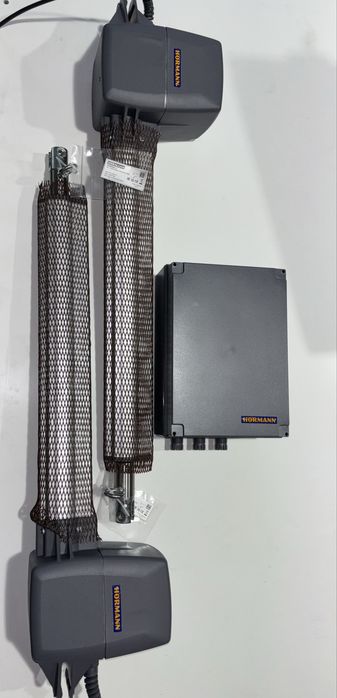 Задвижване Хьорман за отваряеми двукрили  портални врати на панти