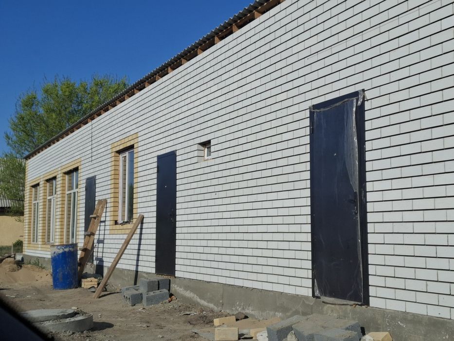 Продам земельный участок с хоз.постройками