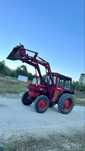 Tractor DT 445 cu incarcator si troliu