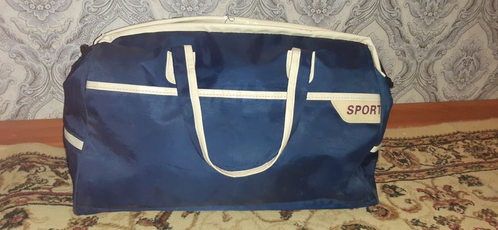 Сумка дорожные синего цвета