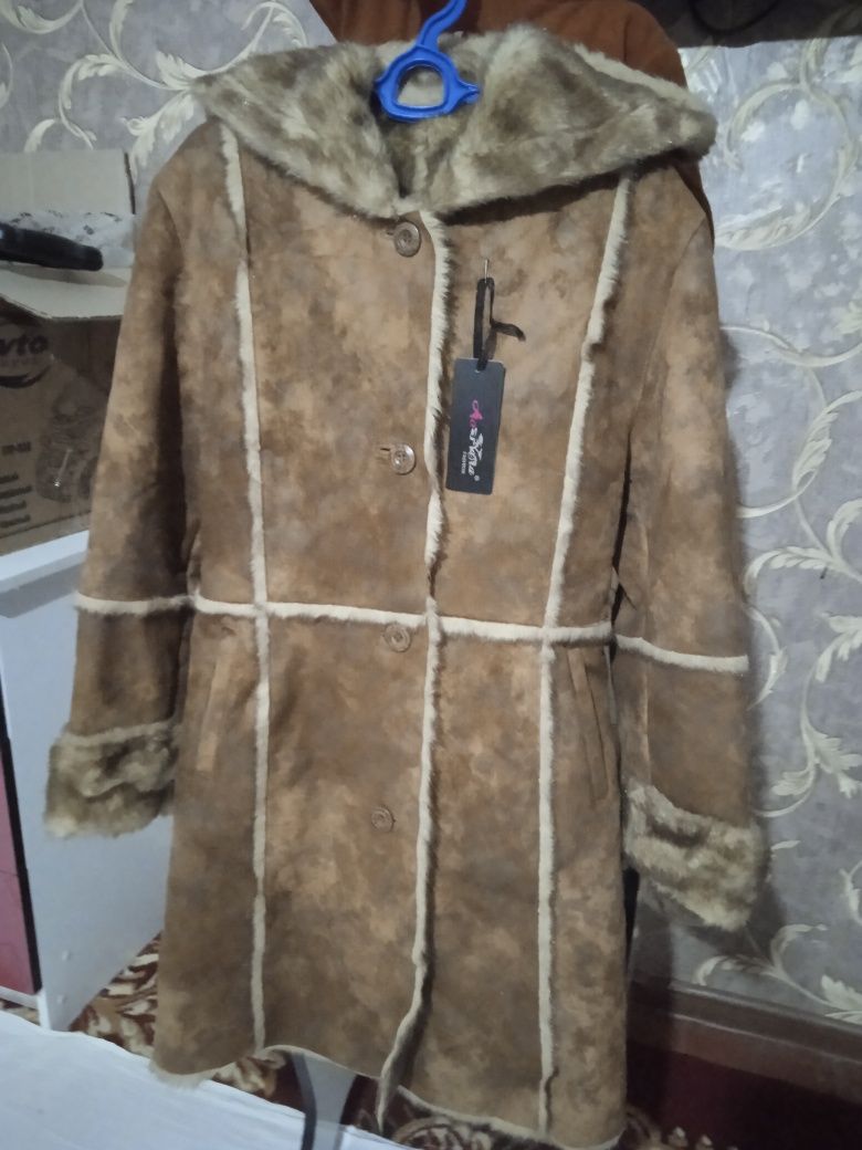 Женский пальто новый
