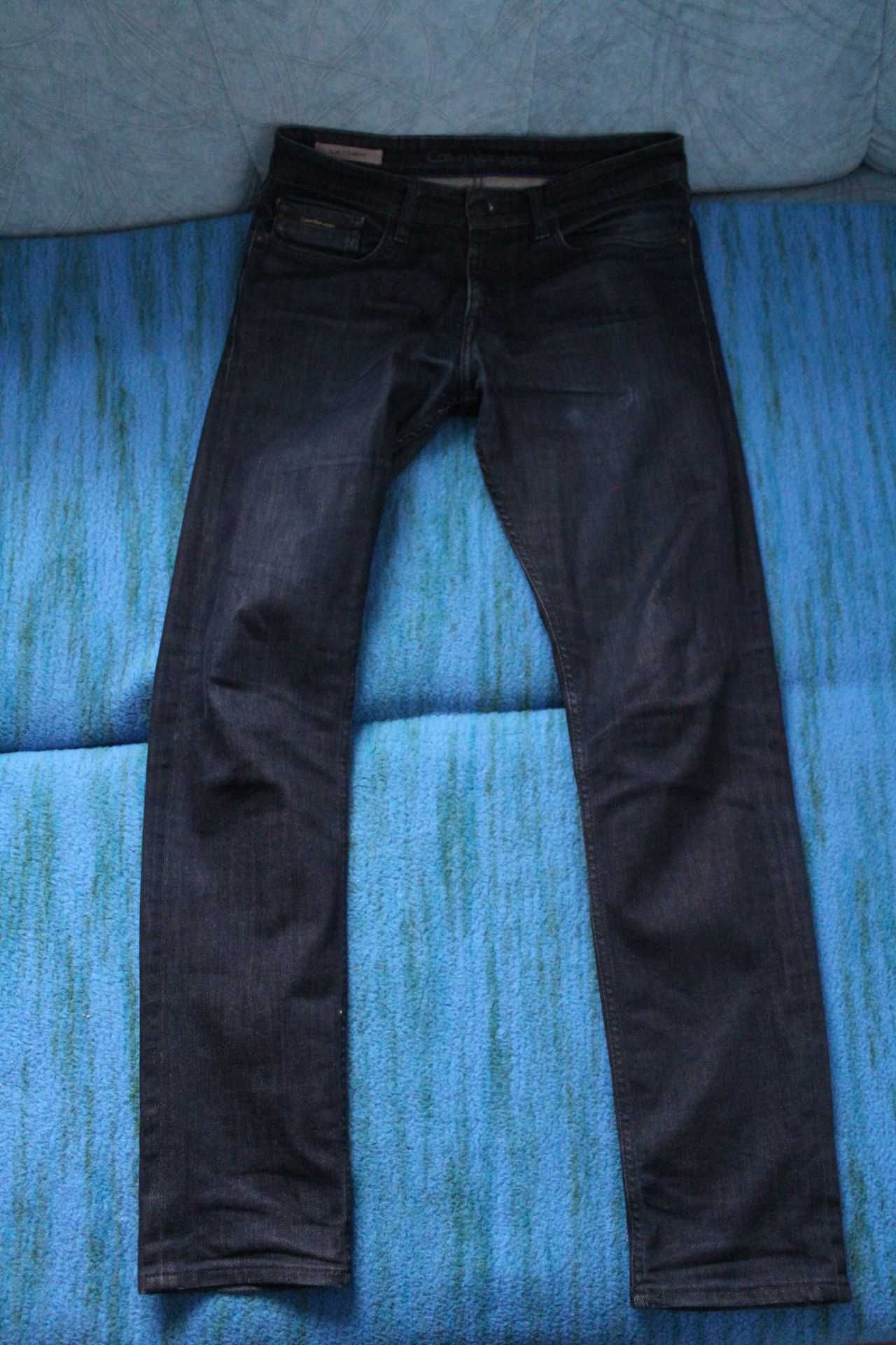 Pufoaica SuperDry S si blugi Calvin Klein Jeans W31 L32