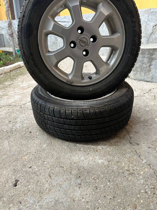 Vând set jante aliaj + cauciucuri iarnă Opel Astra 195/65/R15 DOT 2624