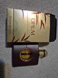 Apa de parfum Opium Yves Saint Laurent