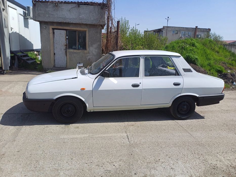 Vând Dacia 1310 an 2004