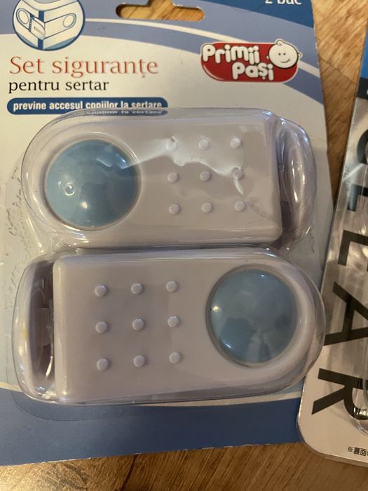 Protectii sertare / sigurante pentru blocarea usilor si sertarelor