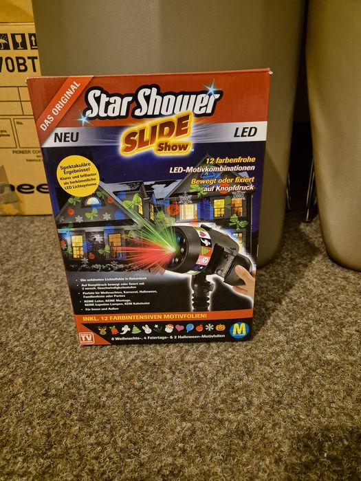 Vand proiector Slide shower cu 12 diapozitive de.sezon