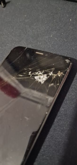 Ecran original iphone xs crapat cu pete negre