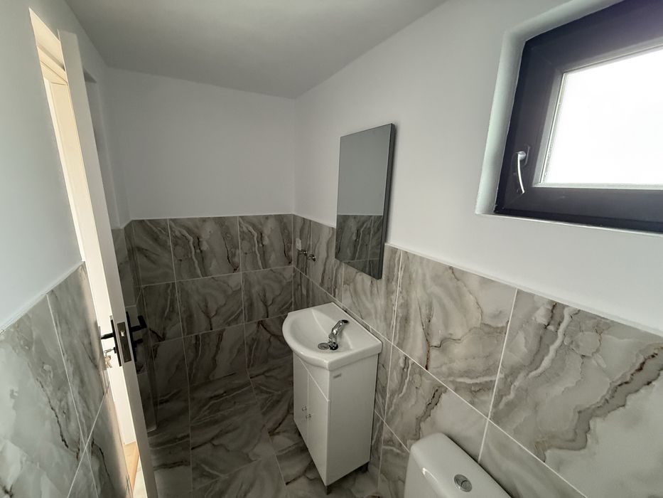 Casă complet renovată + teren 3.242 mp