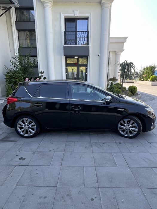 Toyota Auris Hybrid impecabila