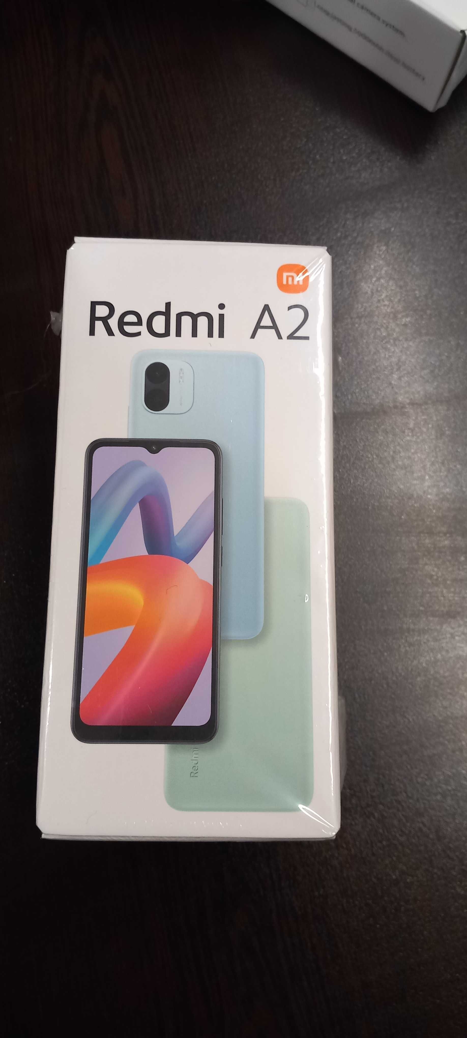 Смартфон Redmi 2 чисто нов в комплект със слушалки