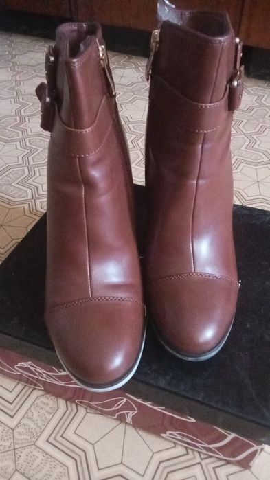 Продам новые сапоги