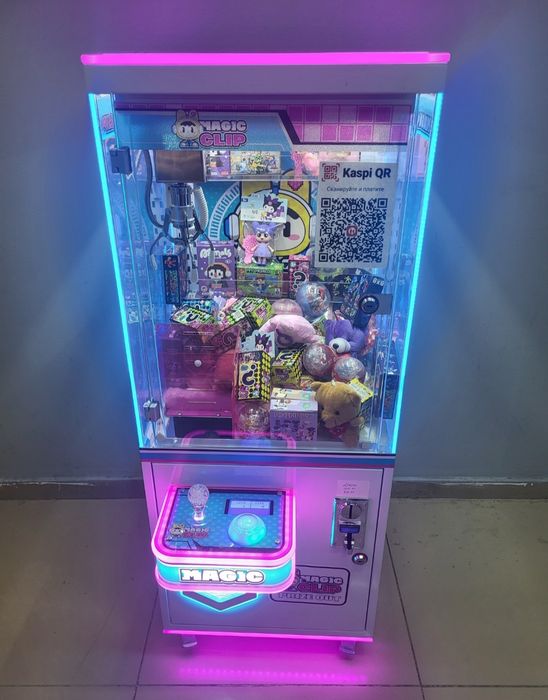 Игровой аппарат с игрушками