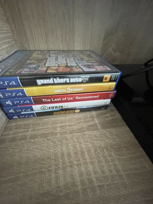 Ps4 slim+2 manete+ jocuri