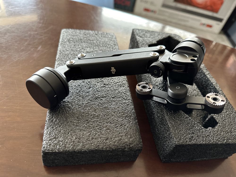 DJi Osmo z-axis като нова