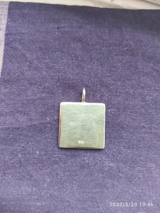 Серебряный кулон Dior..