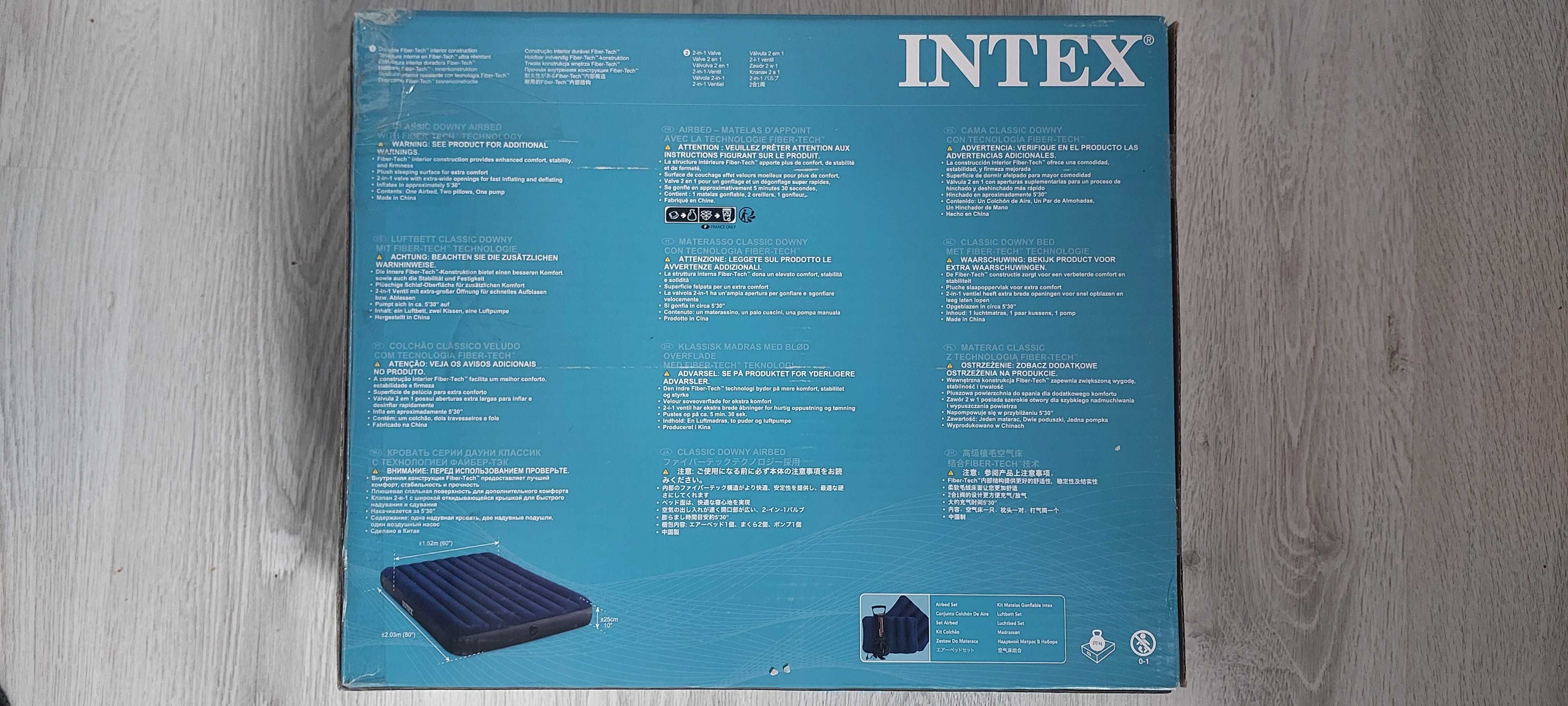 Новый надувной матрас INTEX  с двумя  подушками и насосом.