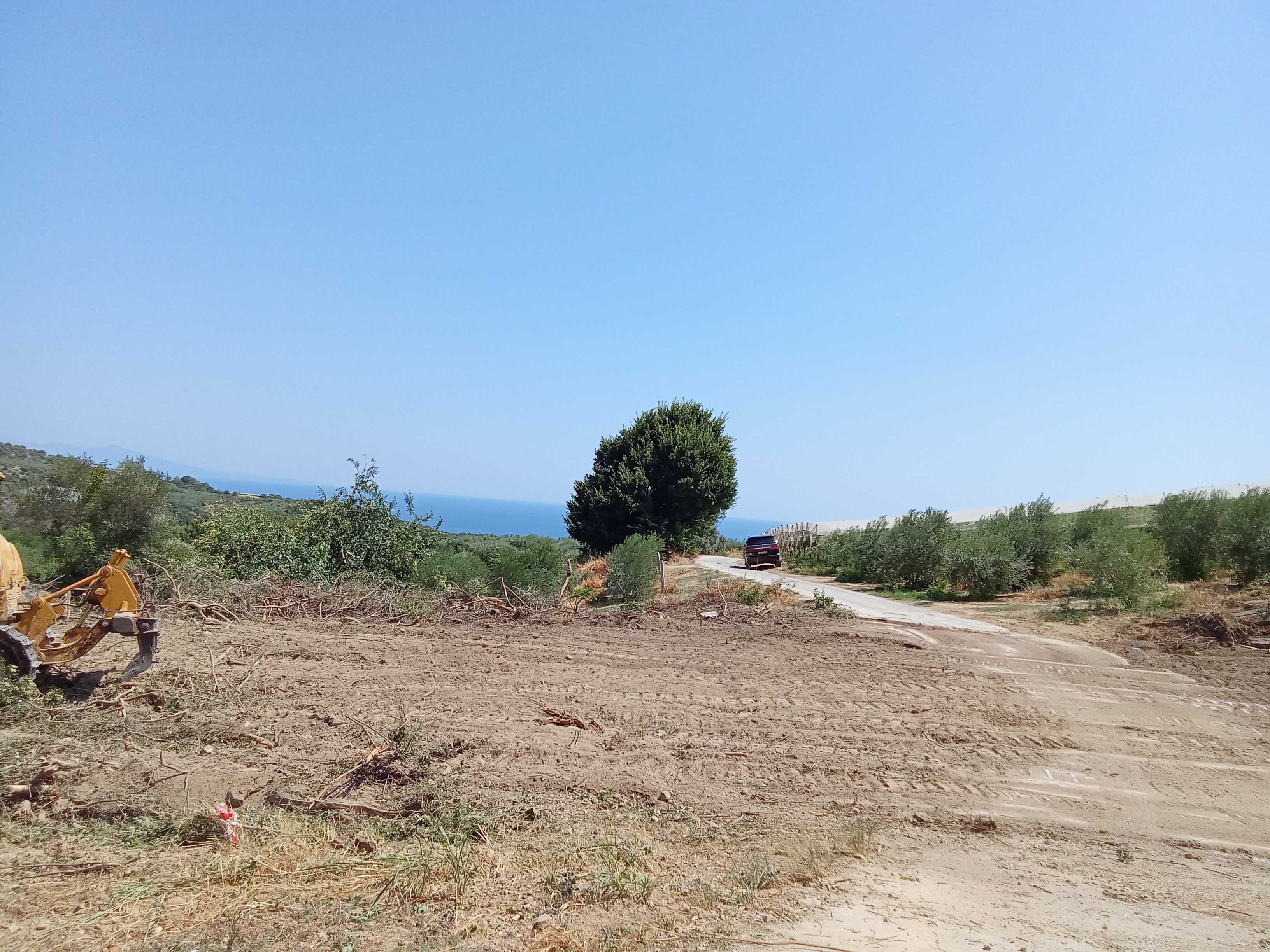 Парцели в Лутра, обл.Кавала за каравана /бунгало, ток и вода.10000 е.