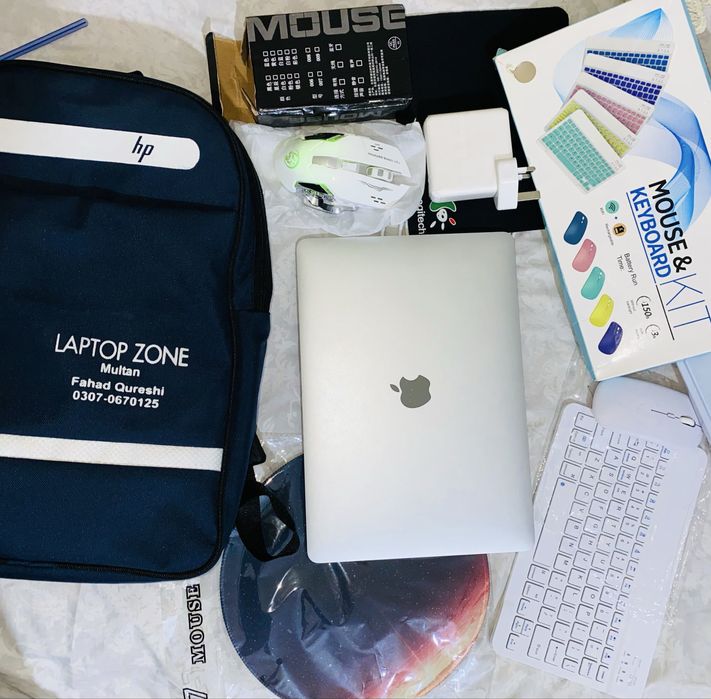 Macbook Air 2019 8/256 core i5 with all accessories..DM for details